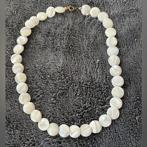 2/$20 Vintage flat disc necklace.